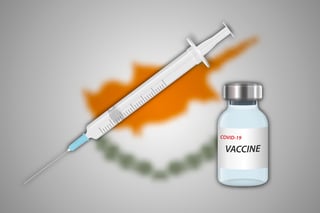 Syringe And Vaccine Vial On Blur Background With Cyprus Flag Template For Vaccination Banne Syringe And Vaccine Vial On Blur Background With Cyprus Flag Template For Vaccination Banne