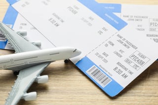 Travel Agency Flight Tickets And Plane Model On Wooden Table Closeup Travel Agency Flight Tickets And Plane Model On Wooden Table Closeup
