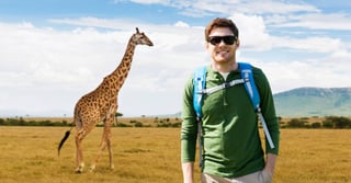 Travel Tourism And People Concept Happy Young Man In Sunglasses With Backpack Over African Travel Tourism And People Concept Happy Young Man In Sunglasses With Backpack Over African