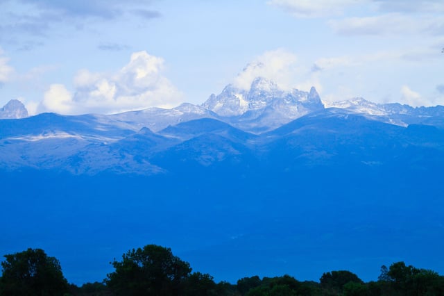 Mount Kenya Peeping Out From The Clouds