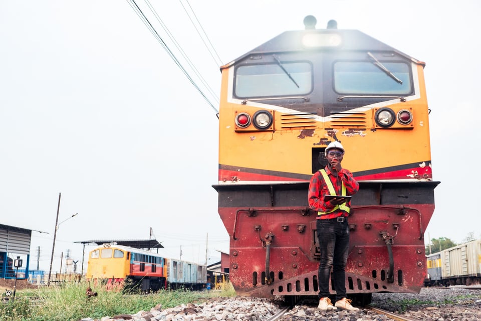 Kenya Railway Engineer Using Tablet And Radio